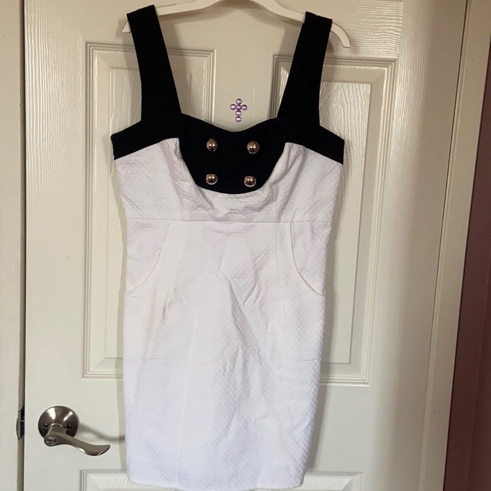 Classy black and white Chanel style dress with silver buttons in size M.